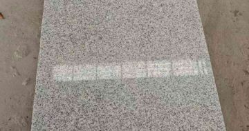 苏州芝麻白光面毛板