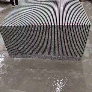 苏州芝麻白毛板荒料切割