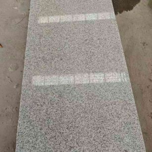 苏州芝麻白光面毛板