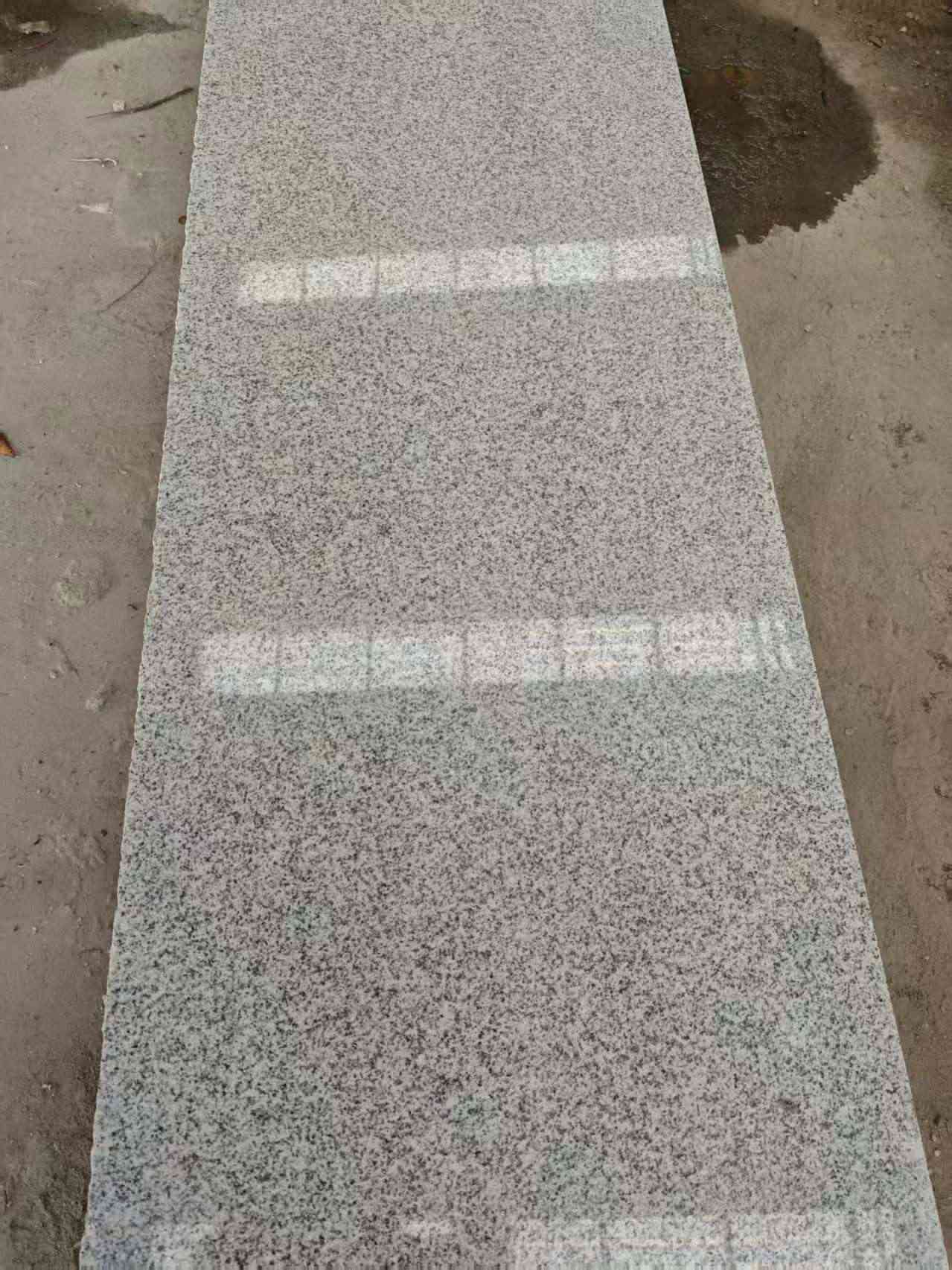 苏州芝麻白光面毛板